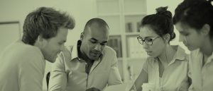 group of young entrepreneurs working together on a project